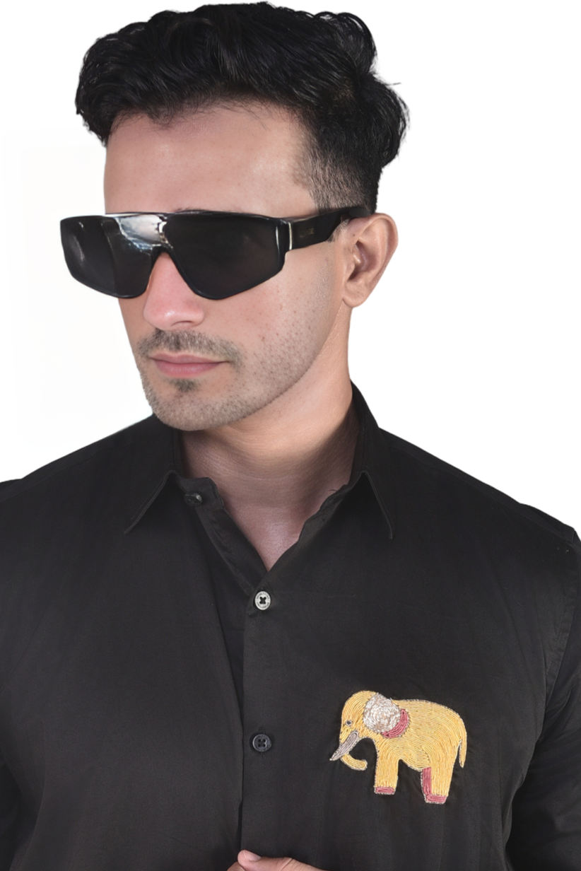 CUTE ELEPHANT EMBROIDERED ON A BLACK SHIRT