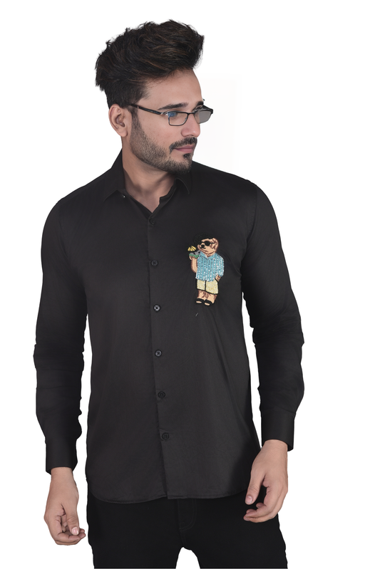 COOL MAN EMBROIDERED ON A BLACK SHIRT