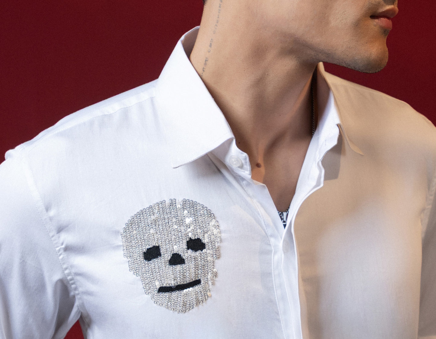 FUNKY SKULL EMBROIDERED ON A WHITE SHIRT