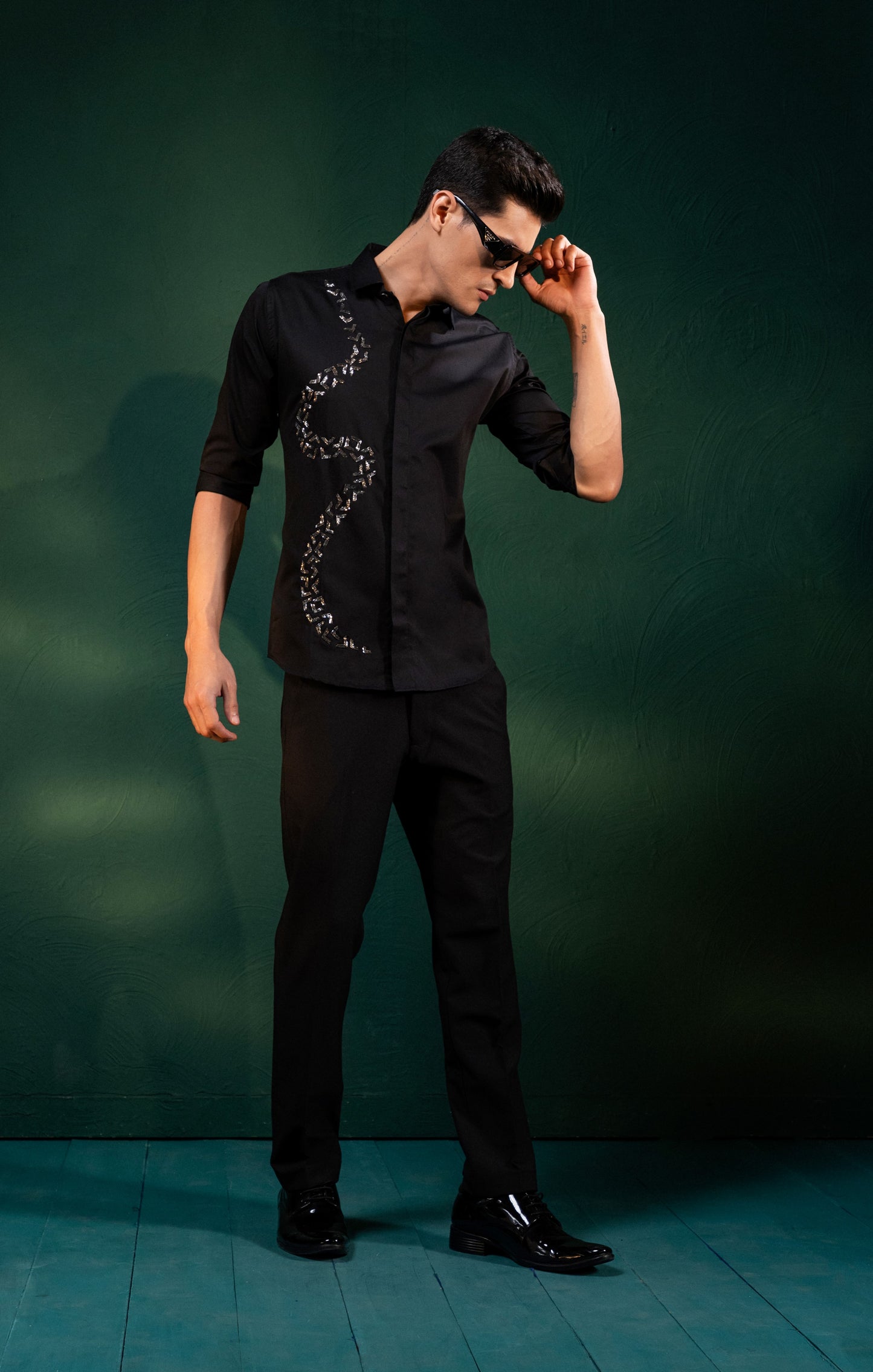 "V SHAPED EMBROIDERY ON A SHIRT"