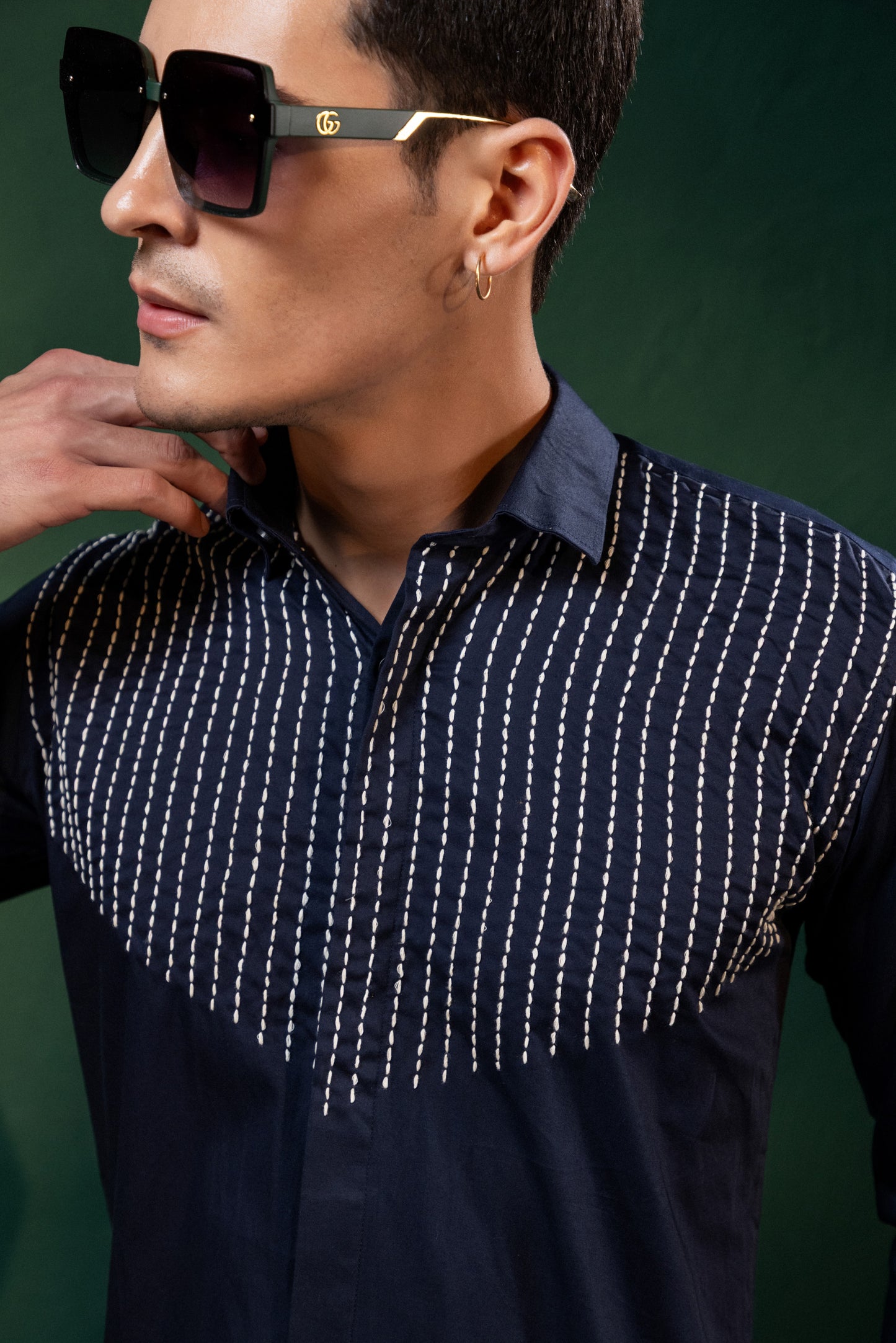 "LINES OF THREAD" EMBROIDERED ON A SHIRT