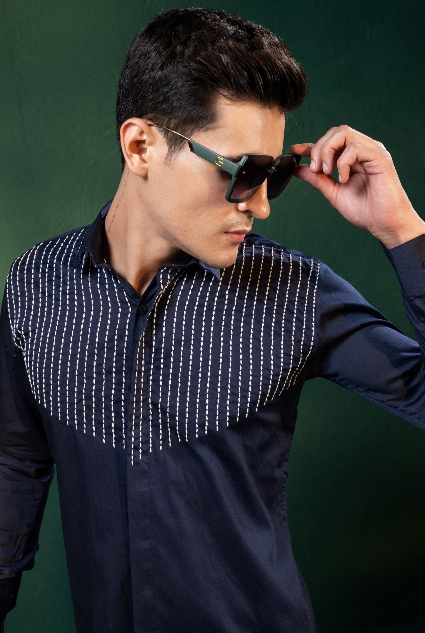 "LINES OF THREAD" EMBROIDERED ON A SHIRT