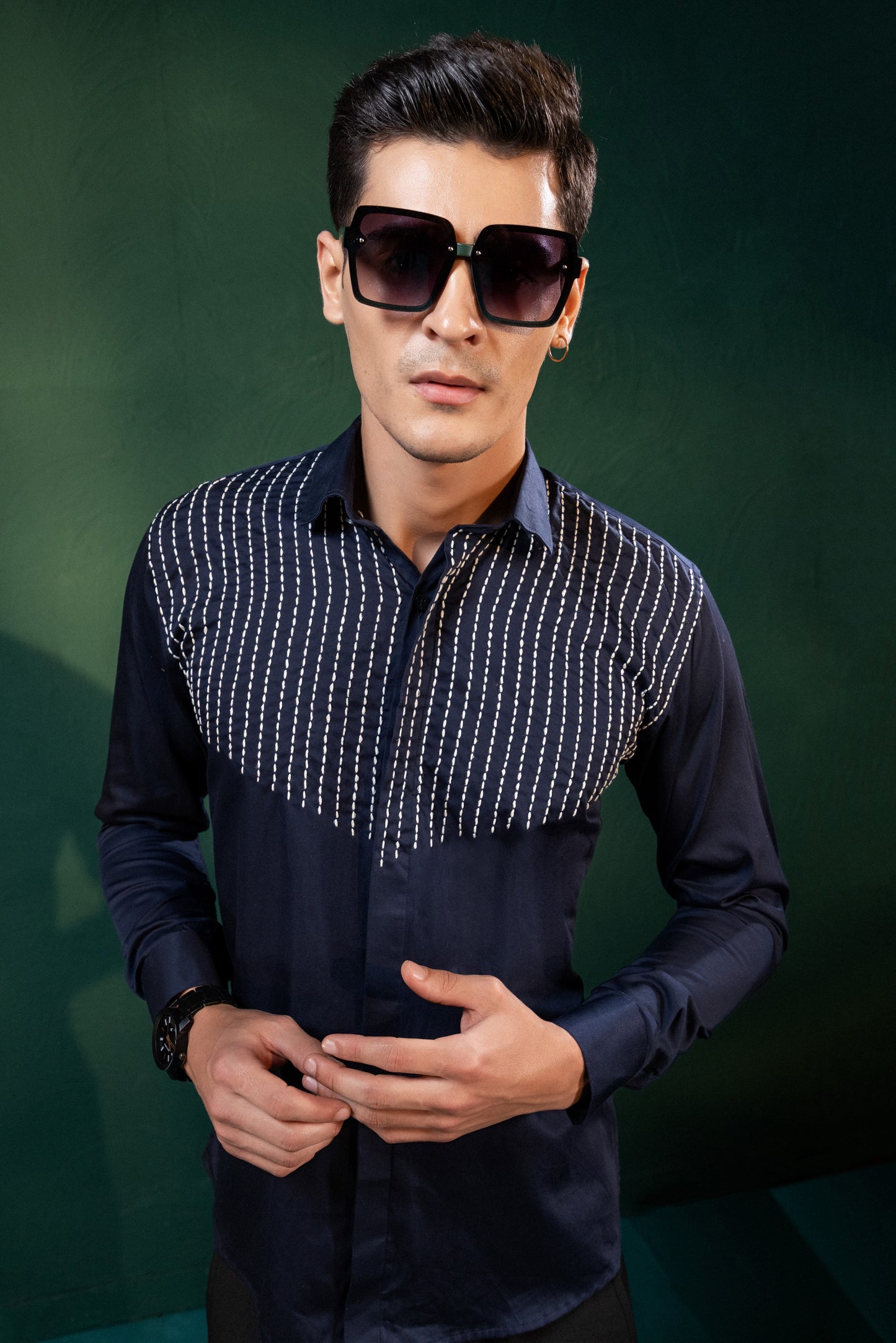 "LINES OF THREAD" EMBROIDERED ON A SHIRT