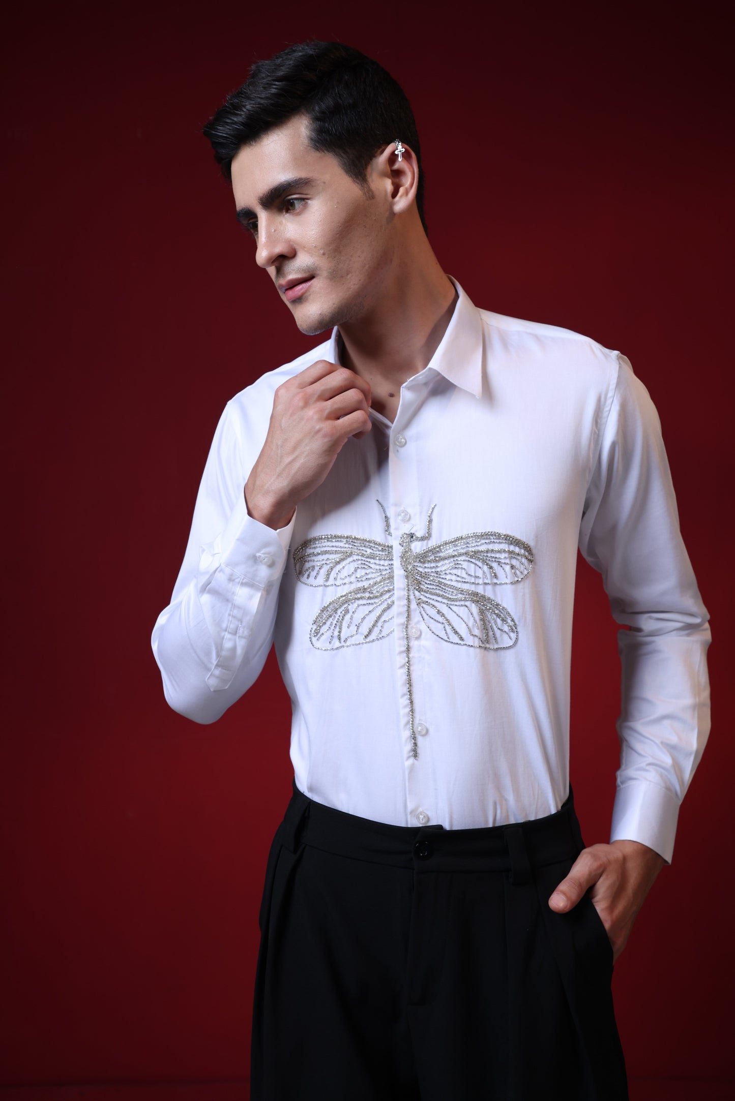 HAND EMBROIDERED DRAGON FLY IN A WHITE SHIRT