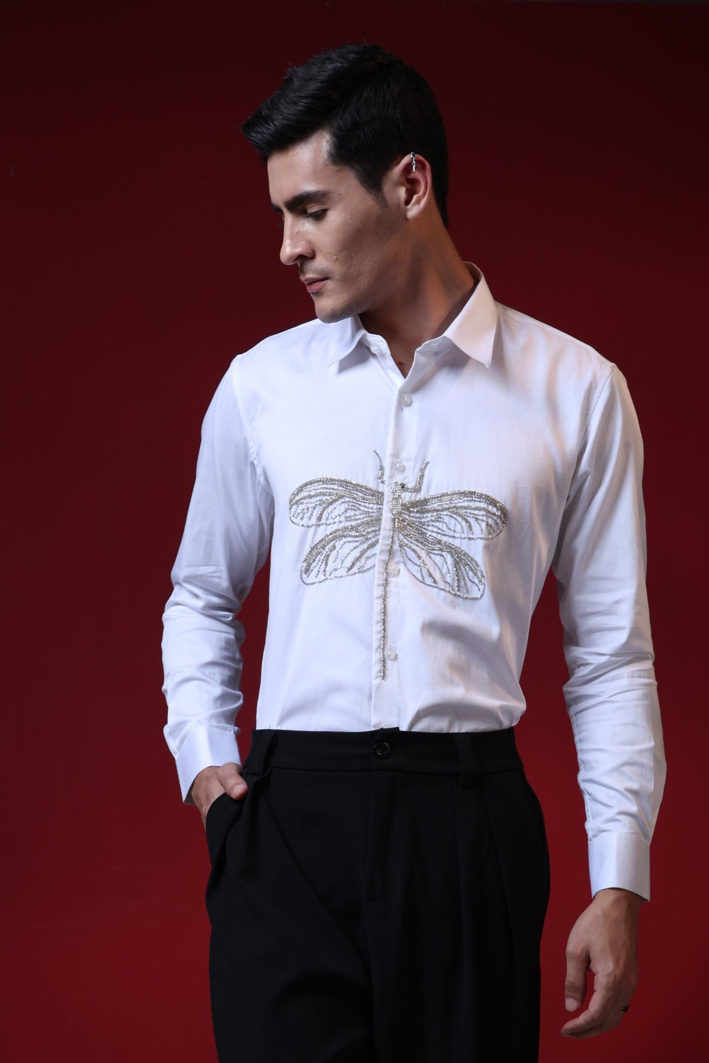 HAND EMBROIDERED DRAGON FLY IN A WHITE SHIRT