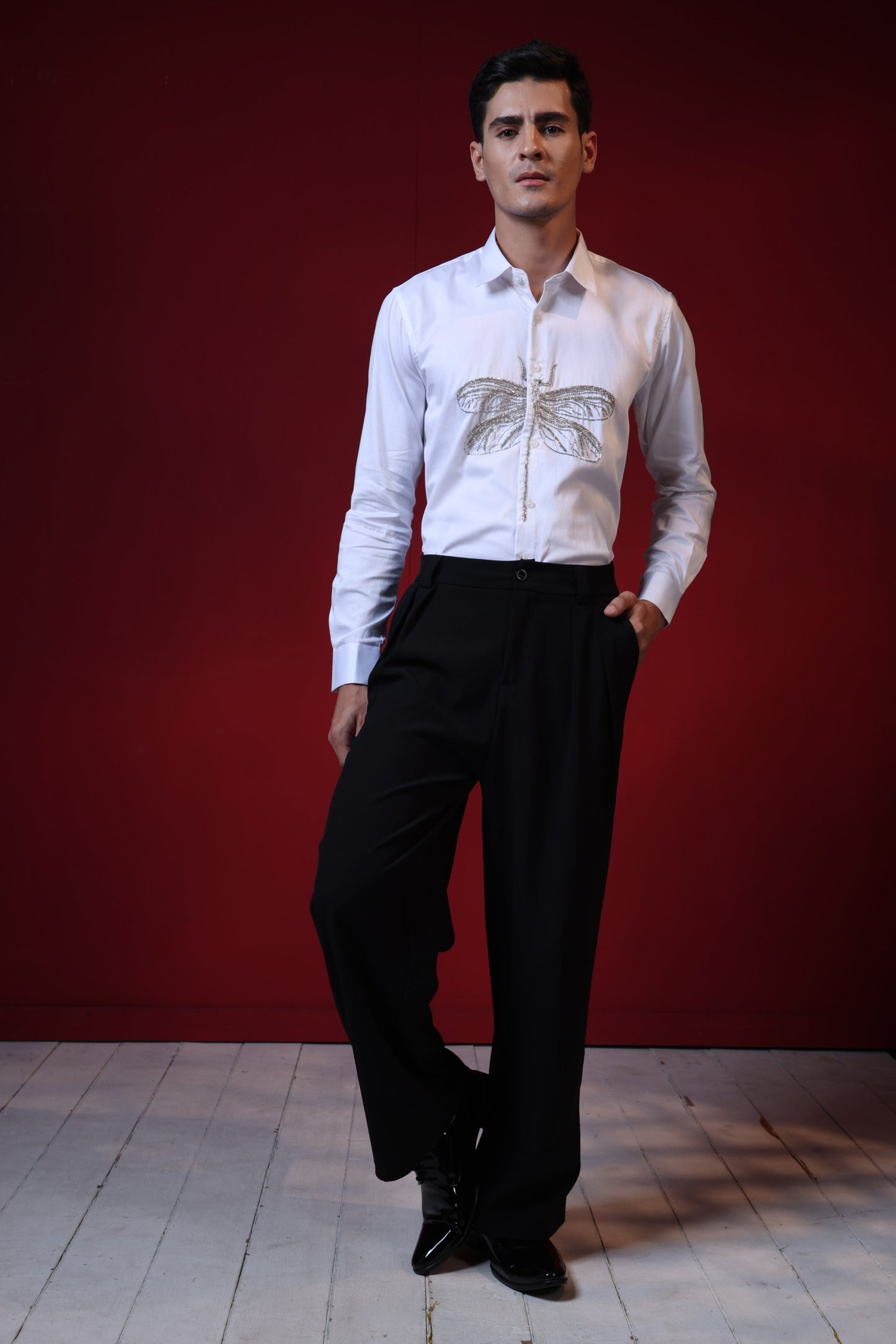 HAND EMBROIDERED DRAGON FLY IN A WHITE SHIRT