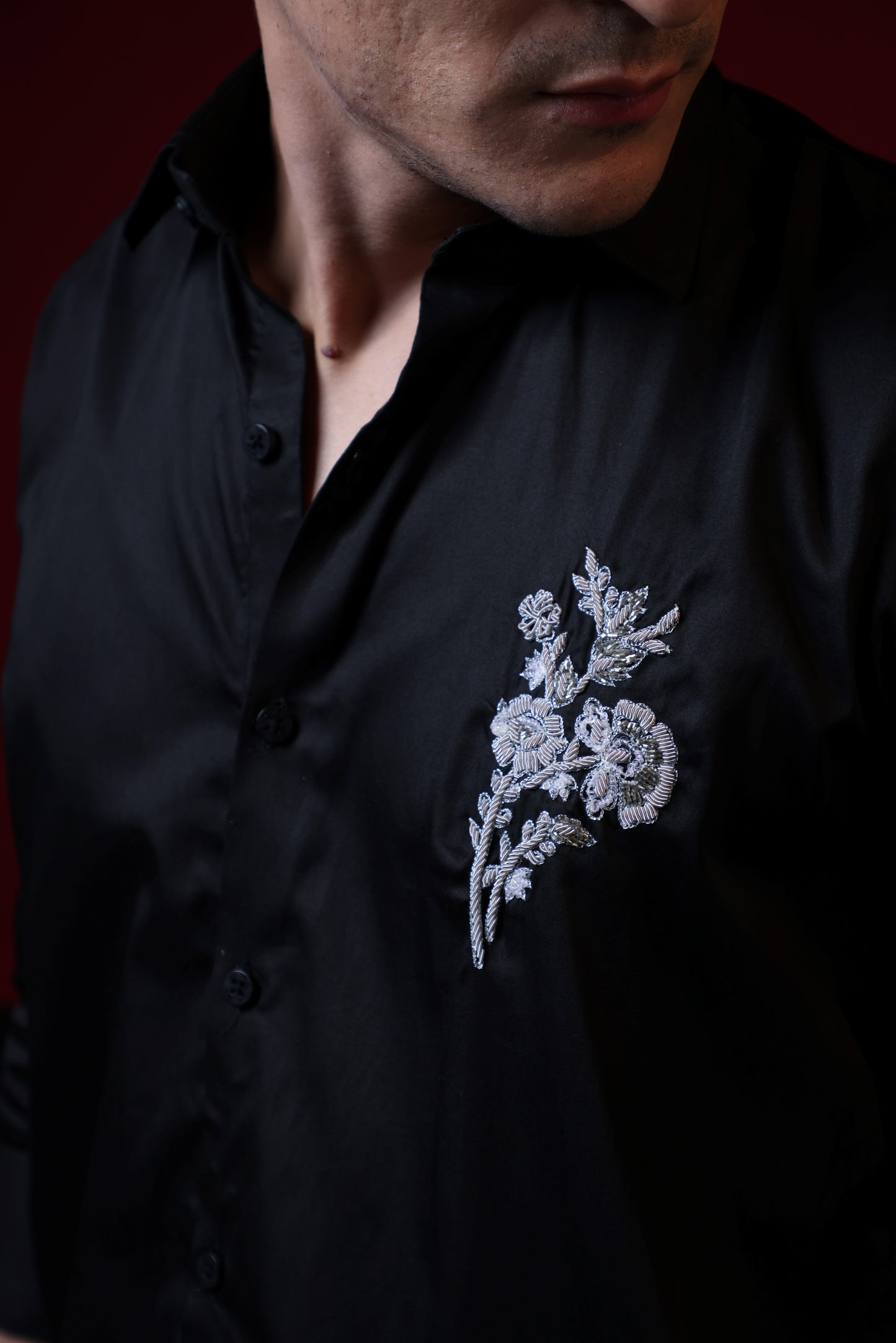 BEAUTIFUL FLOWER EMBROIDERED ON A SHIRT
