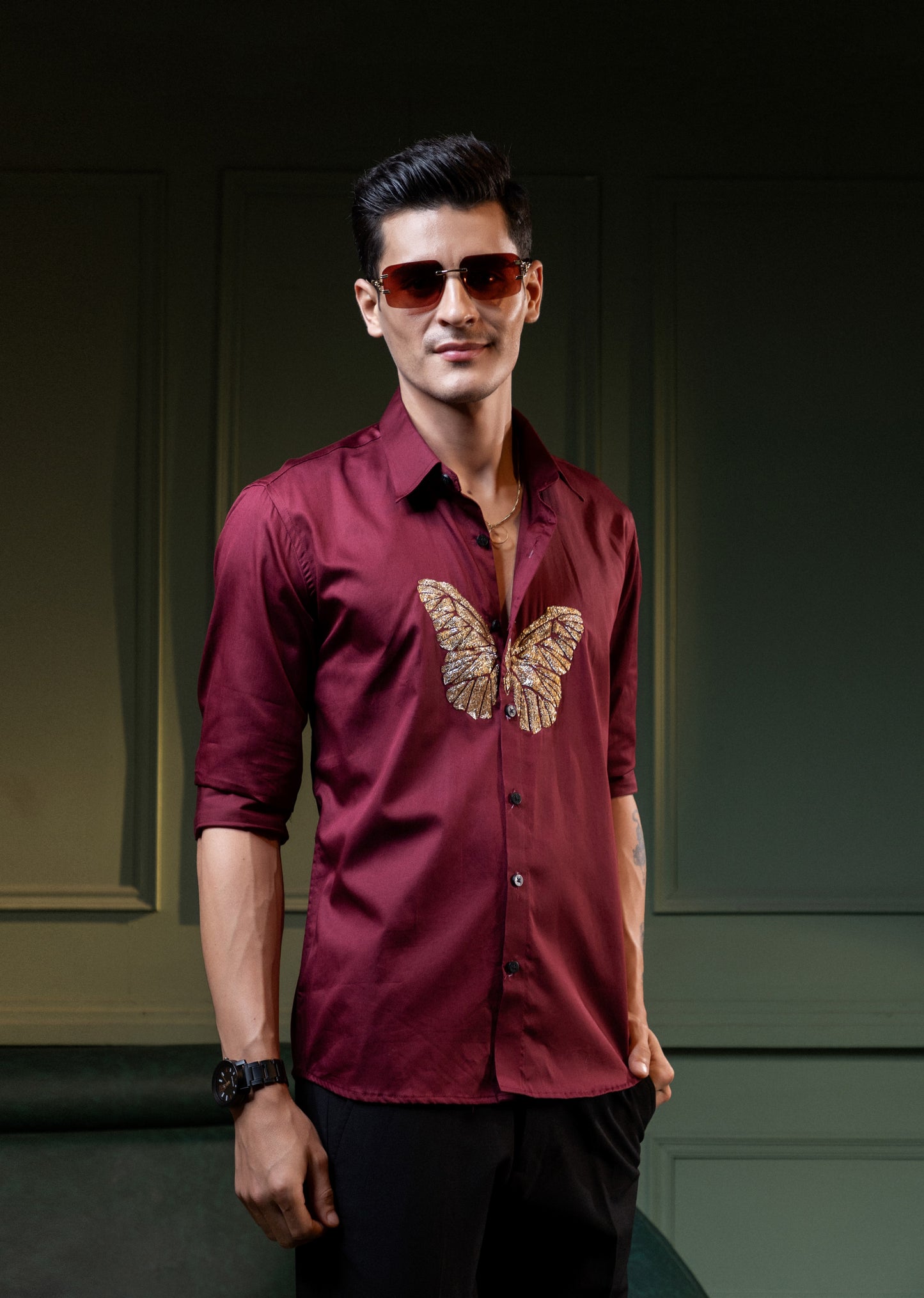"BUTTERFLY" EMBROIDERED ON A MAROON SHIRT