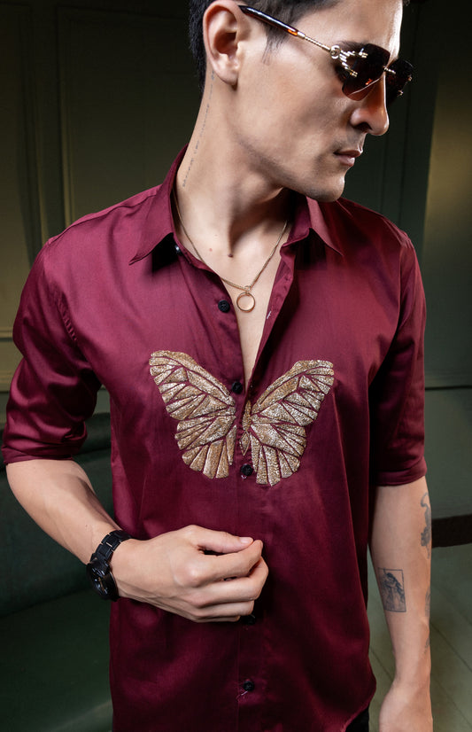 "BUTTERFLY" EMBROIDERED ON A MAROON SHIRT