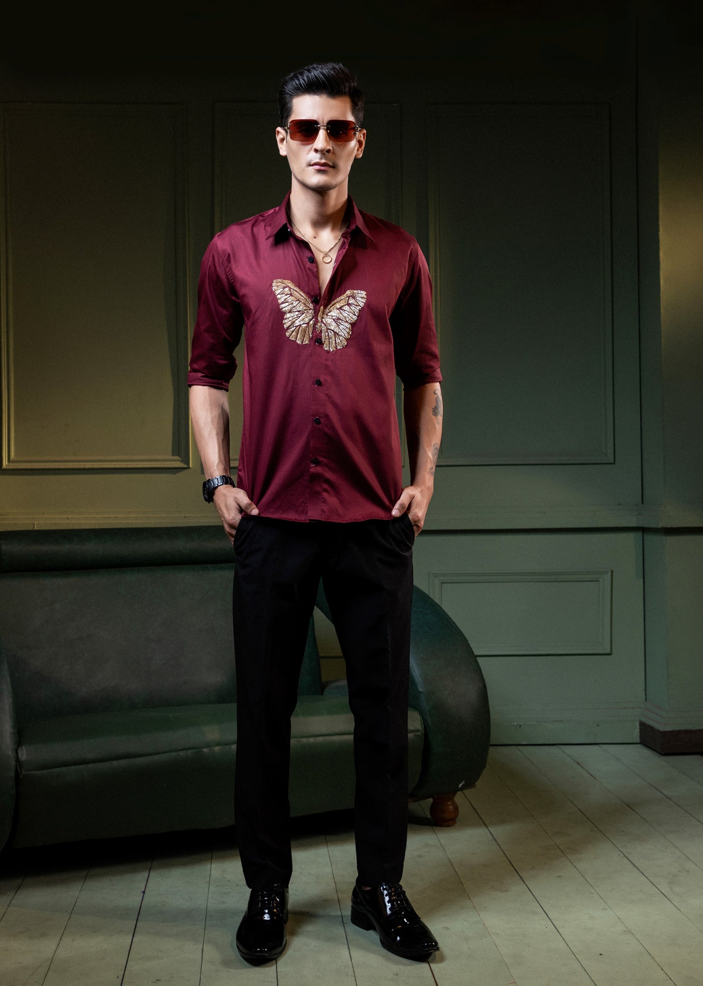 "BUTTERFLY" EMBROIDERED ON A MAROON SHIRT