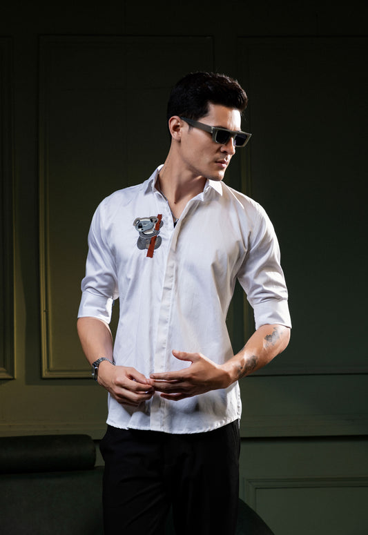"HANGING BEAR" BEAUTIFULLY EMBROIDERED ON A SHIRT