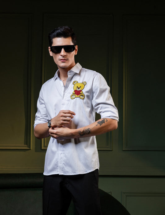 "TEDDY BEAR" EMBROIDERED ON A WHITE SHIRT