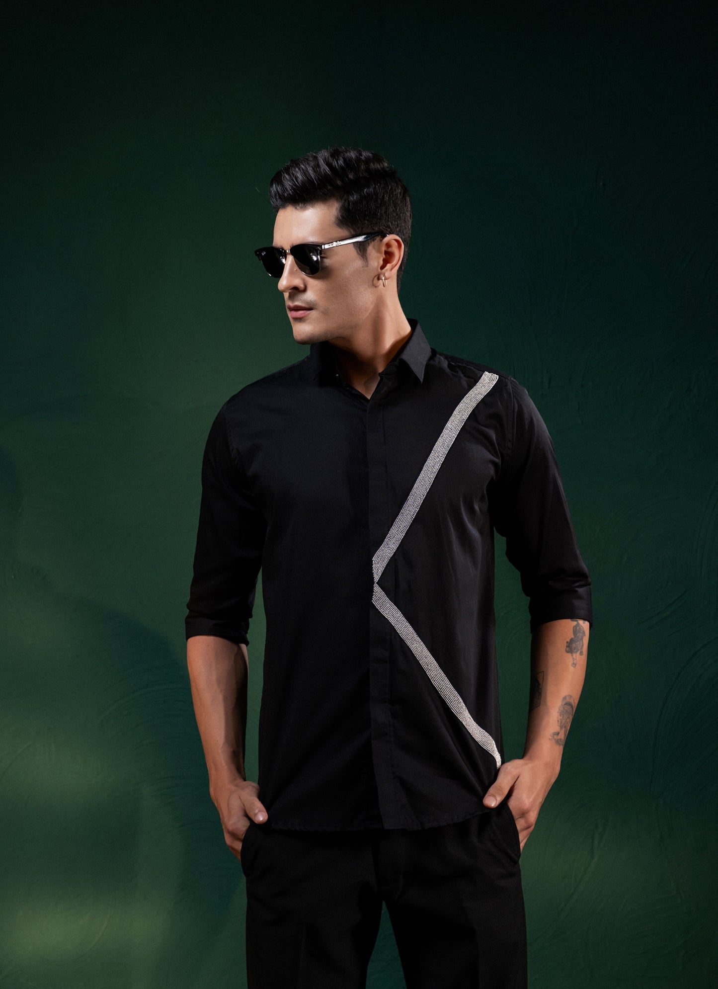 A PAIR OF LINES EMBROIDERED ON A SHIRT
