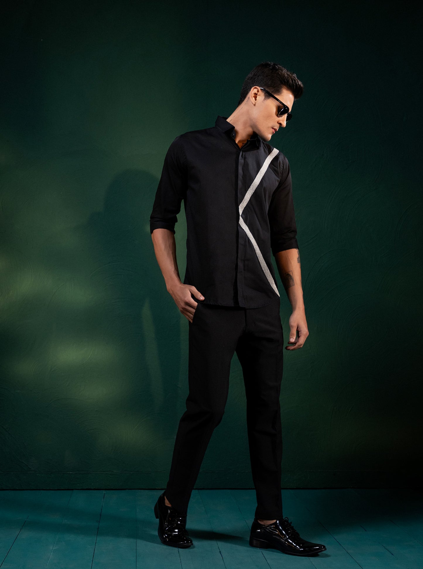A PAIR OF LINES EMBROIDERED ON A SHIRT