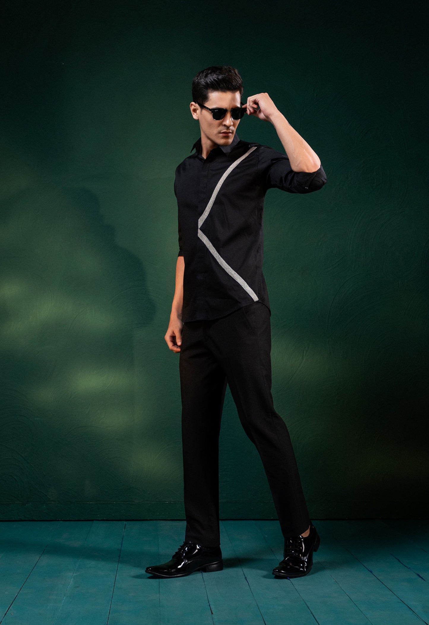 A PAIR OF LINES EMBROIDERED ON A SHIRT