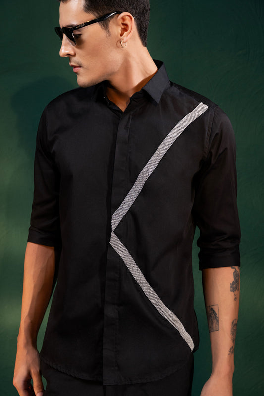 A PAIR OF LINES EMBROIDERED ON A SHIRT