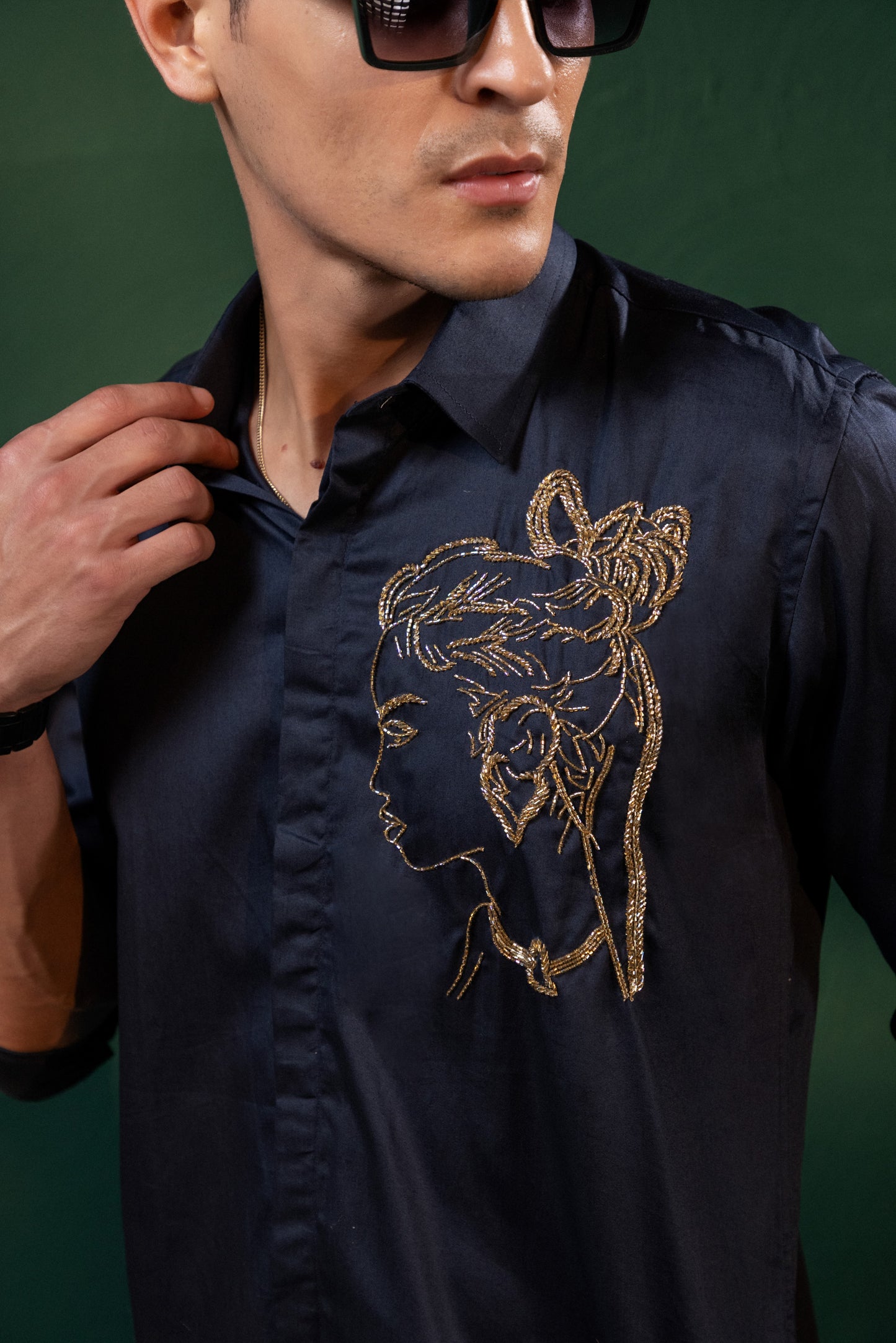 A BEAUTIFUL GIRL'S  FACE EMBROIDERED ON A SHIRT