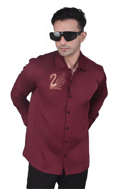 SWAN HAND EMBROIDERED ON A MAROON SHIRT