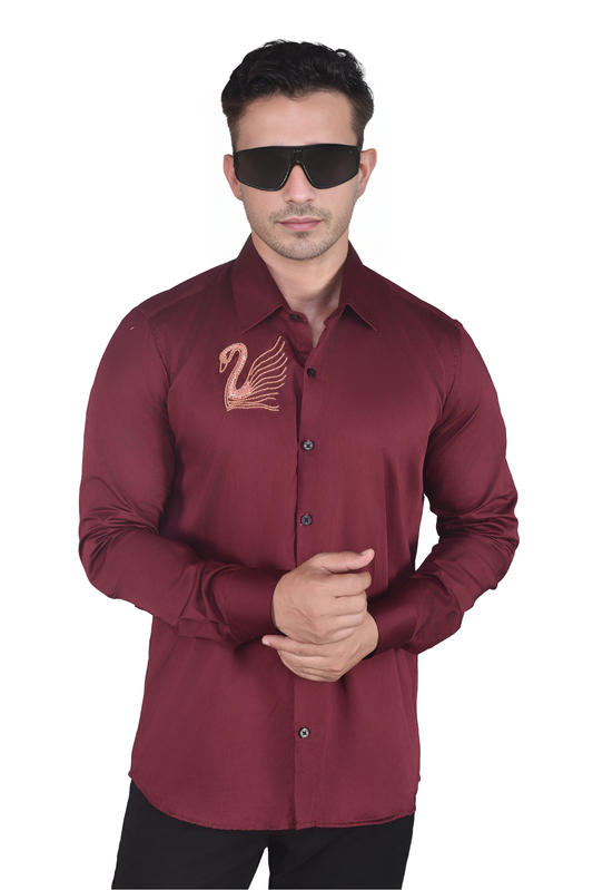 SWAN HAND EMBROIDERED ON A MAROON SHIRT