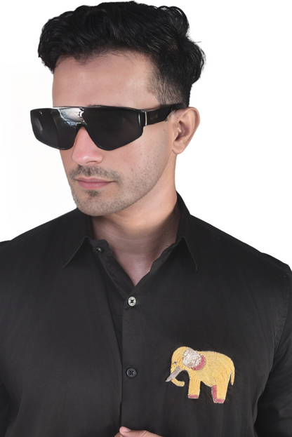 CUTE ELEPHANT EMBROIDERED ON A BLACK SHIRT