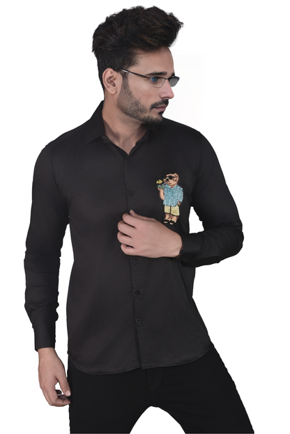 COOL MAN EMBROIDERED ON A BLACK SHIRT