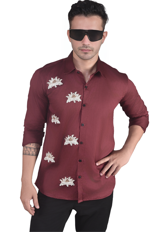 LOTUS FLOWERS BEAUTIFULLY EMBROIDRED ON A MAROON SHIRT
