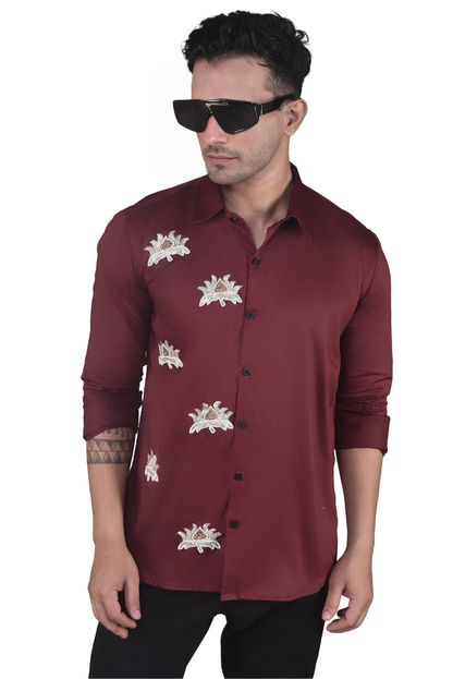 LOTUS FLOWERS BEAUTIFULLY EMBROIDRED ON A MAROON SHIRT