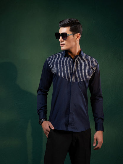 "LINES OF THREAD" EMBROIDERED ON A SHIRT