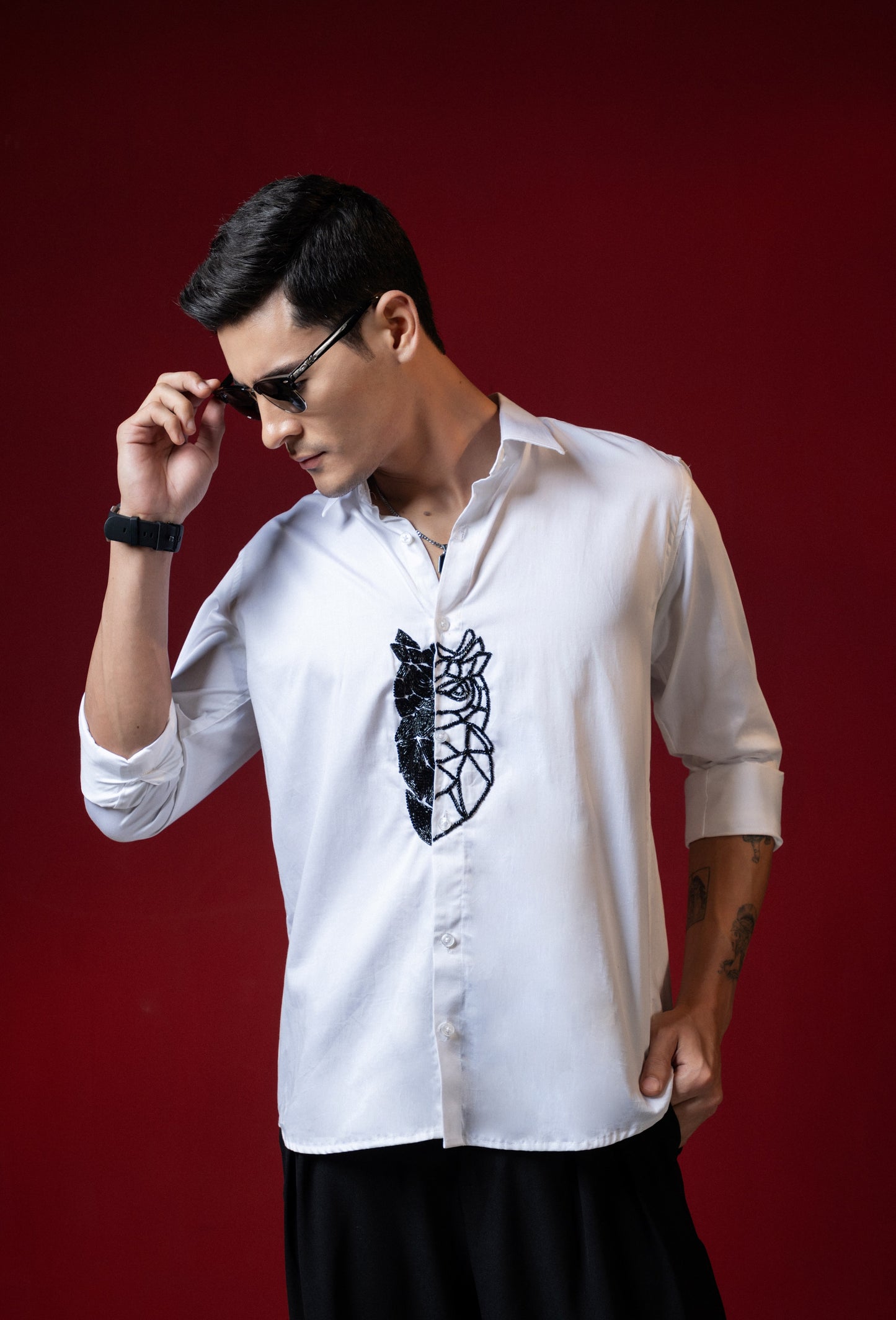 OWL EMBROIDERED ON A WHITE SHIRT