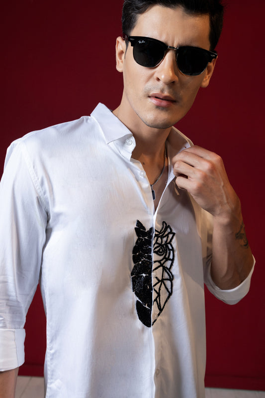 OWL EMBROIDERED ON A WHITE SHIRT
