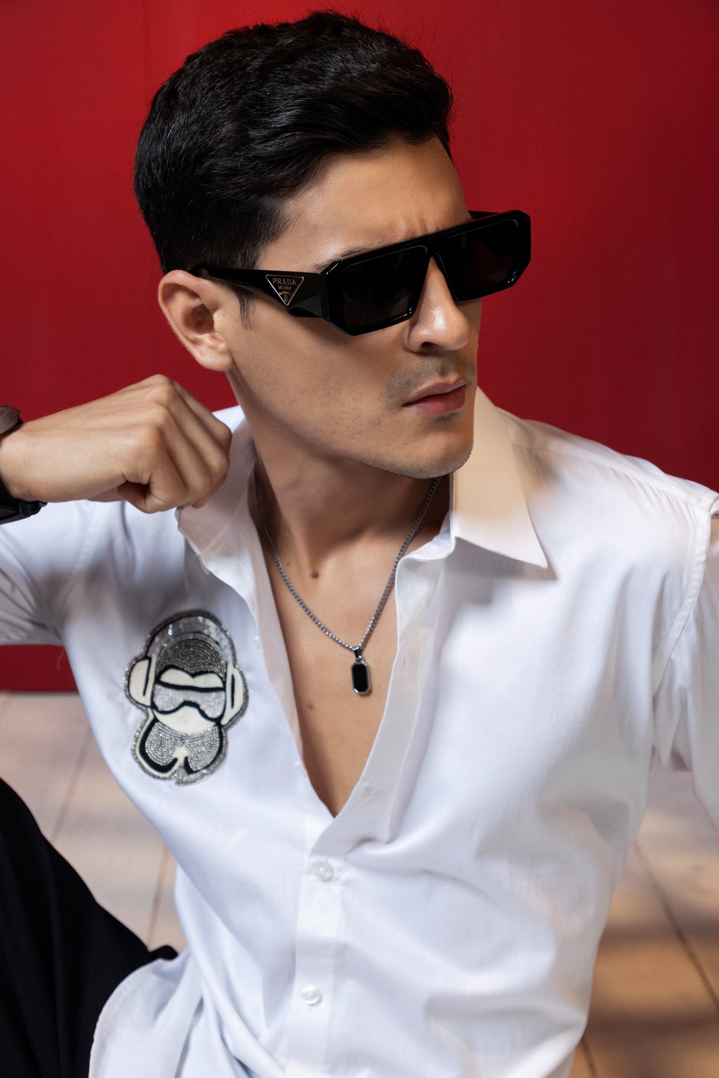 MONKEY WITH A HEADPHONE HAND EMBROIDERED ON A SHIRT