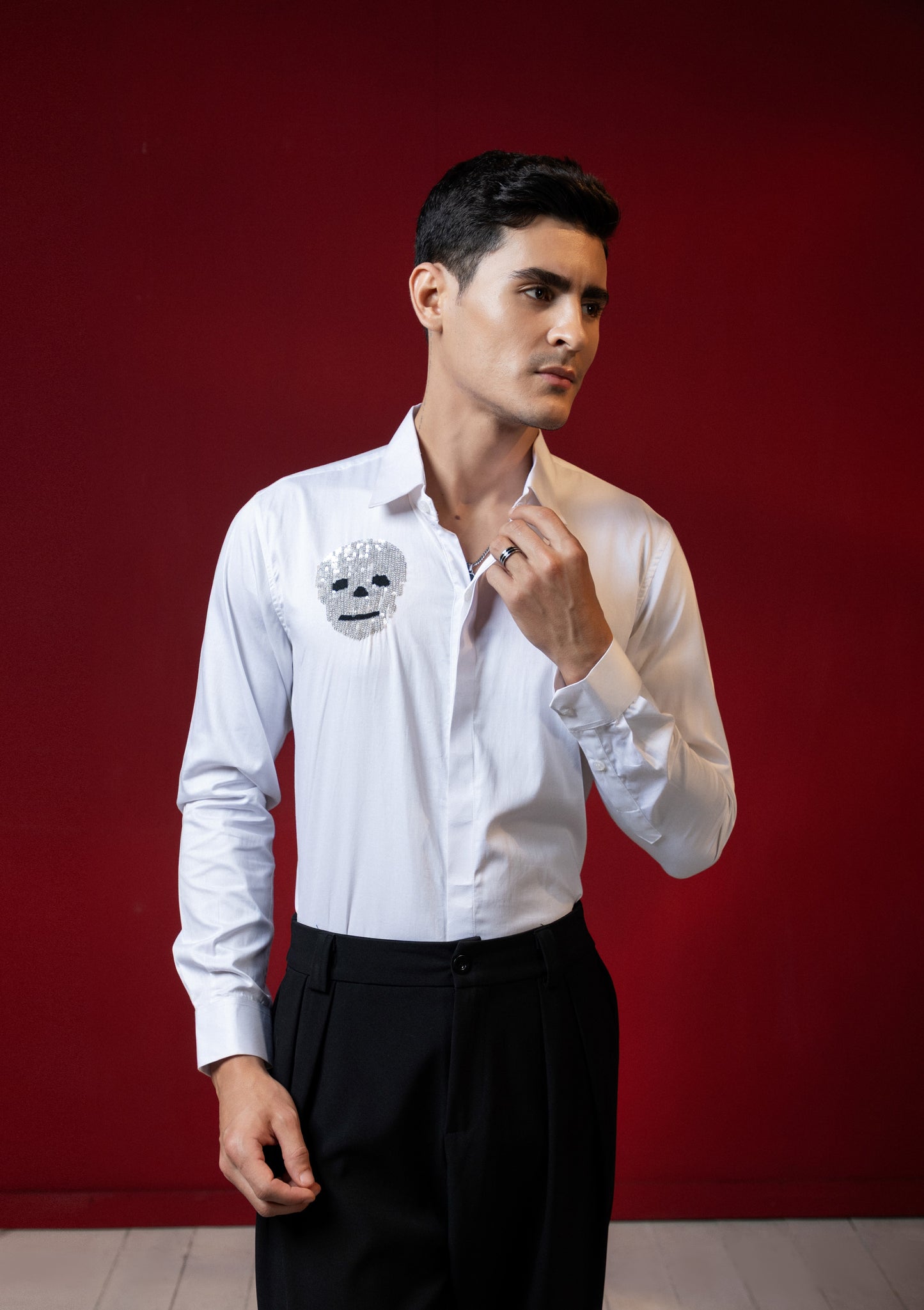 FUNKY SKULL EMBROIDERED ON A WHITE SHIRT