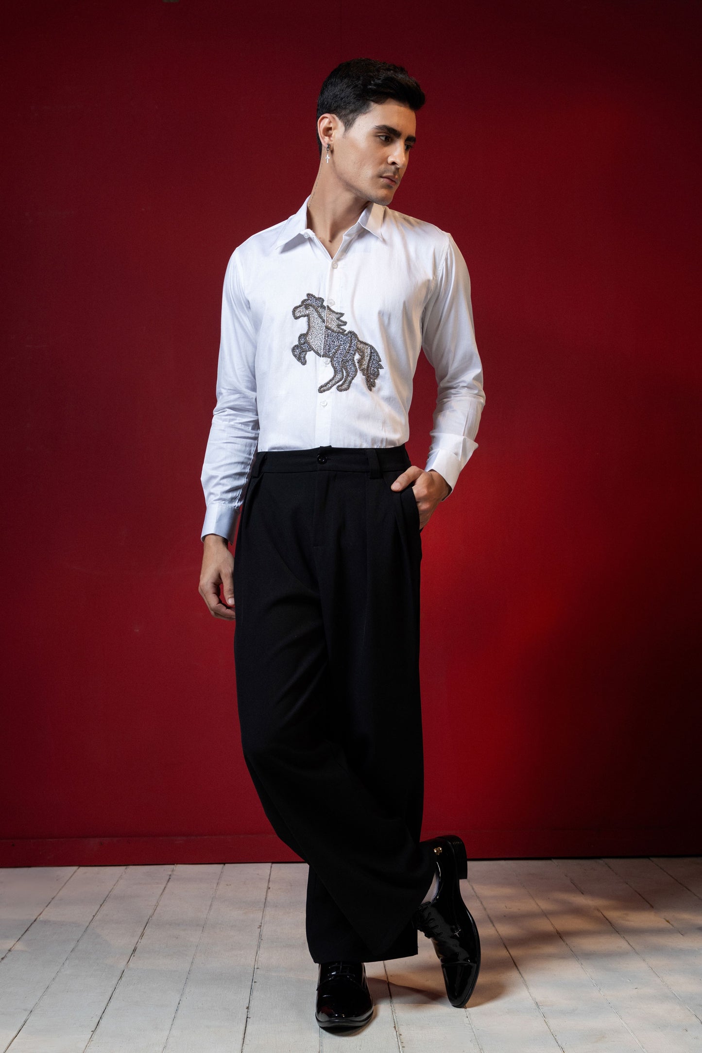 HORSE EMBROIDERED ON A WHITE SHIRT