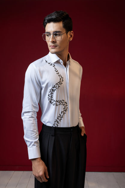 V SHAPED EMBROIDERY ON A WHITE SHIRT