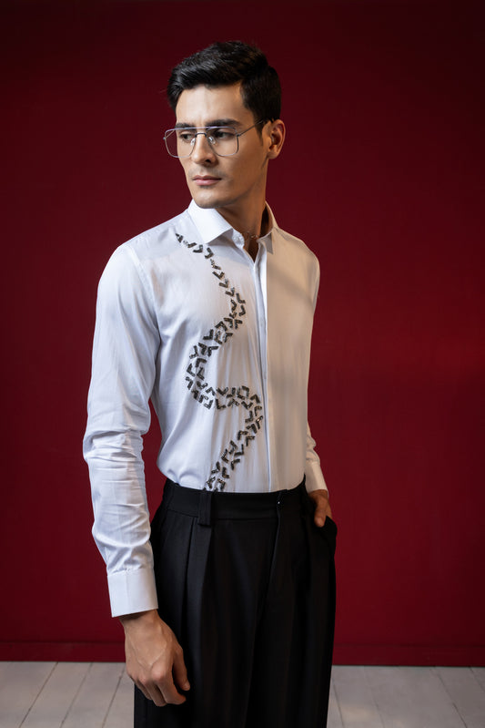 V SHAPED EMBROIDERY ON A WHITE SHIRT