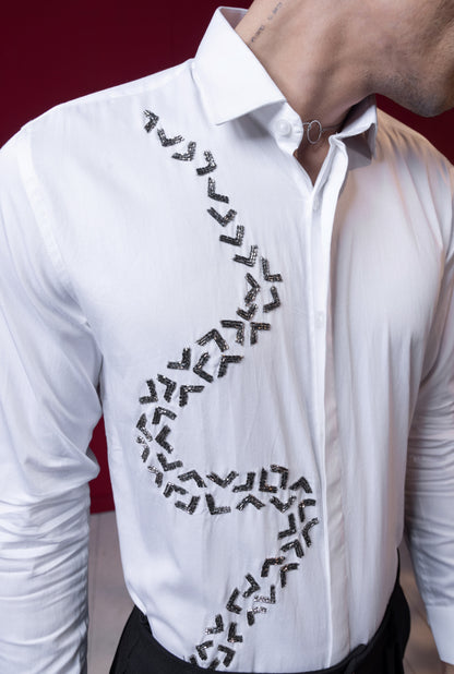 V SHAPED EMBROIDERY ON A WHITE SHIRT