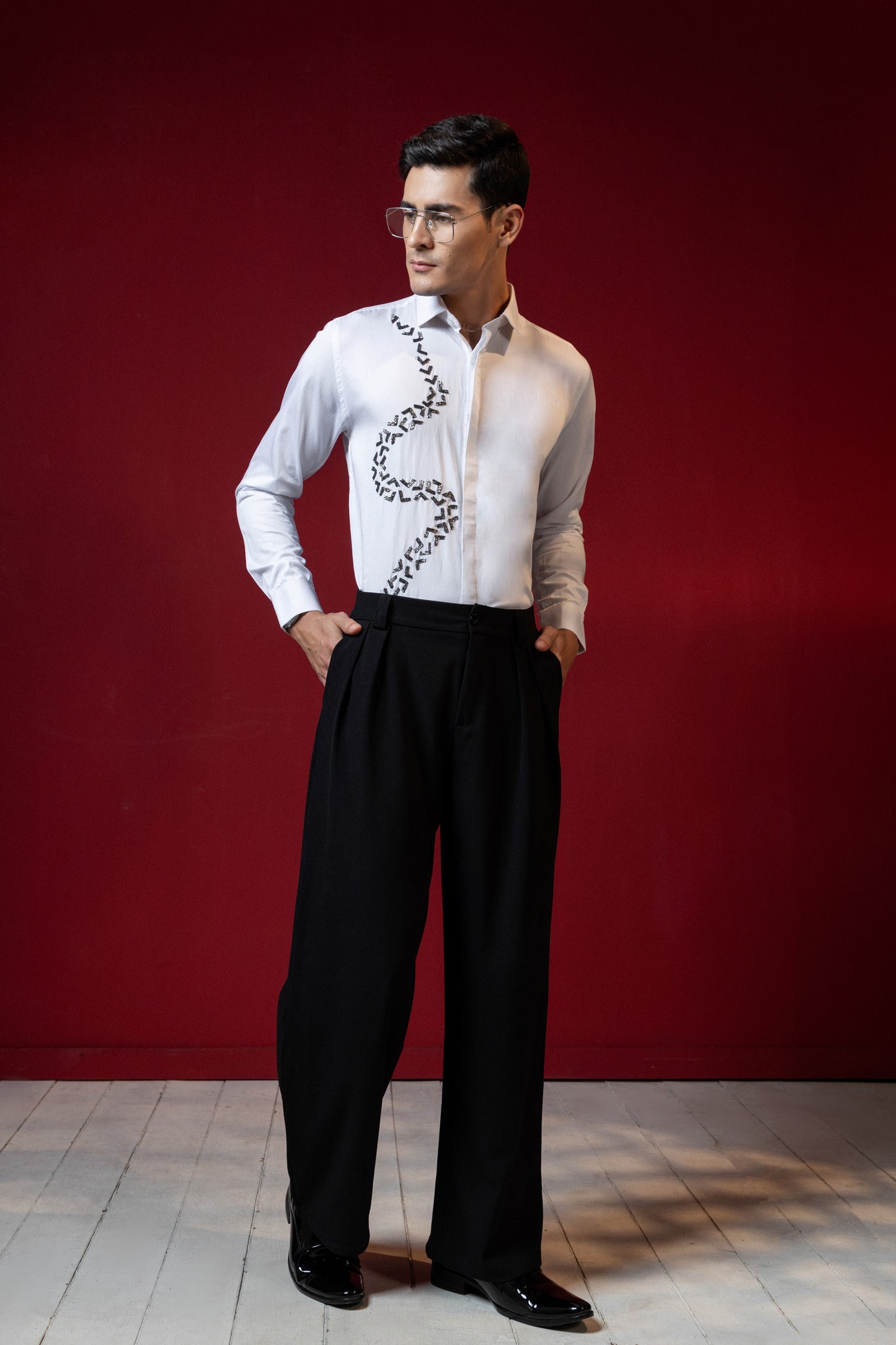V SHAPED EMBROIDERY ON A WHITE SHIRT