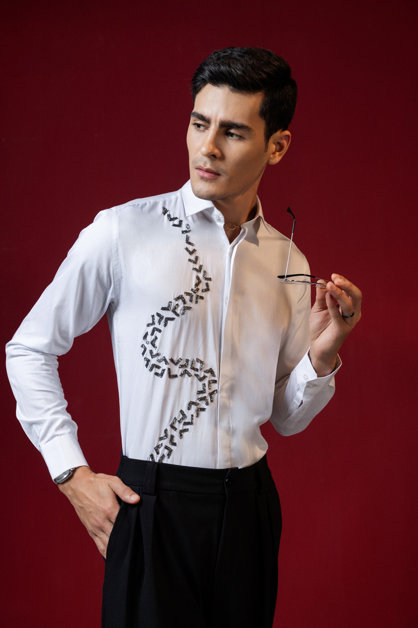 V SHAPED EMBROIDERY ON A WHITE SHIRT