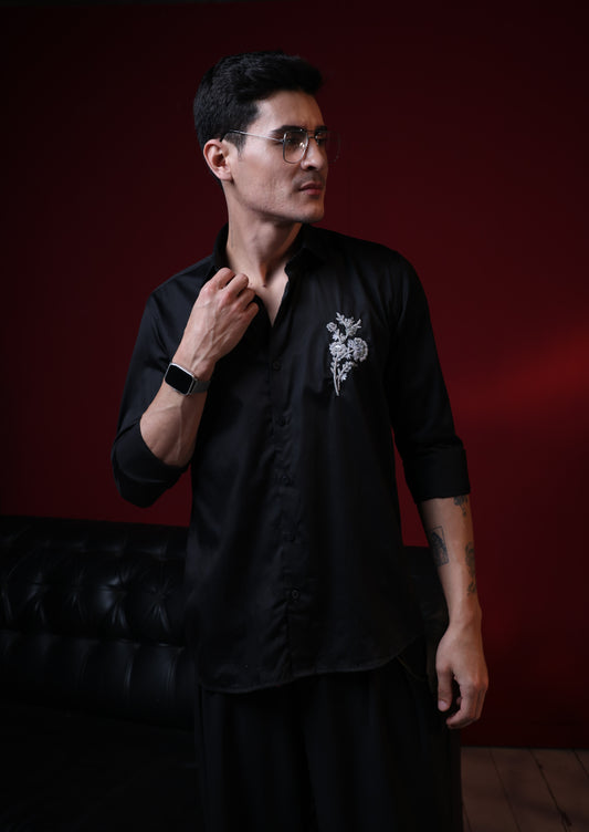 BEAUTIFUL FLOWER EMBROIDERED ON A SHIRT