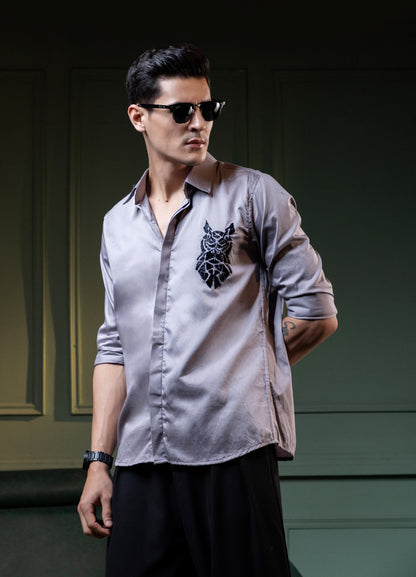 OWL EMBROIDERED ON A GRAY SHIRT