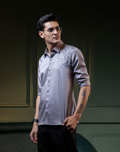 "GRAY WEB" EMBROIDERED ON A SHIRT