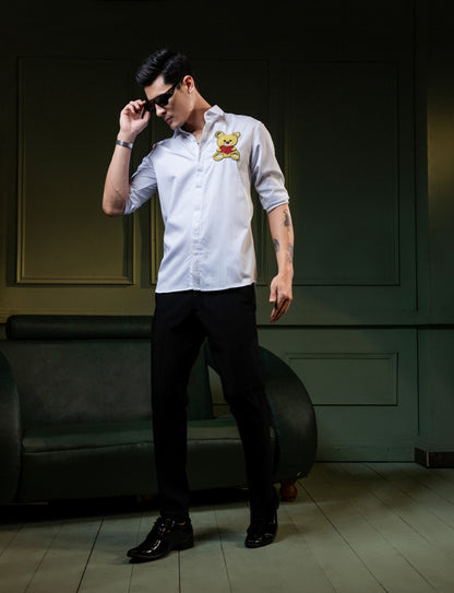"TEDDY BEAR" EMBROIDERED ON A WHITE SHIRT