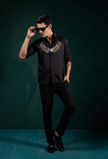"DIAMOND BIRD" EMBROIDERED ON A SHIRT
