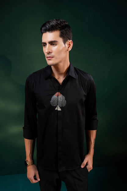 "SPADE" EMBROIDERED ON A SHIRT