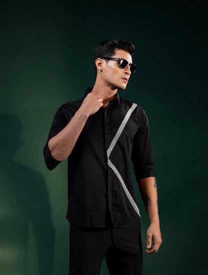 A PAIR OF LINES EMBROIDERED ON A SHIRT