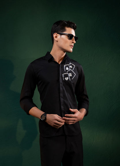 ACES EMBROIDERED ON A BLACK SHIRT
