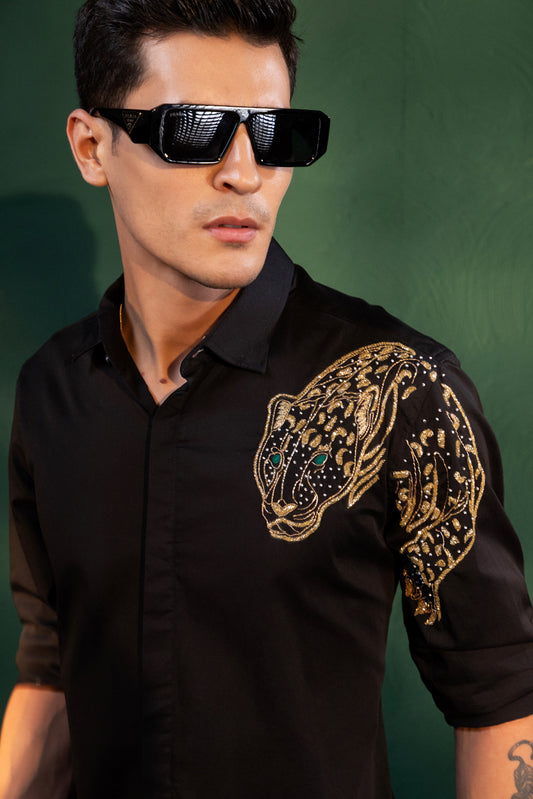 "LION" EMBROIDERED ON A SHIRT