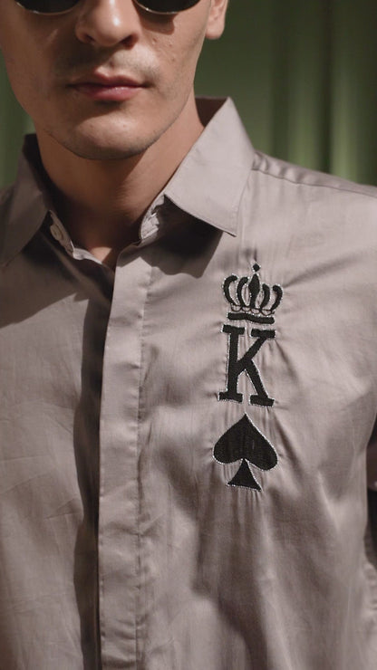 "KING OF SPADES" EMBROIDERED ON A GRAY SHIRT