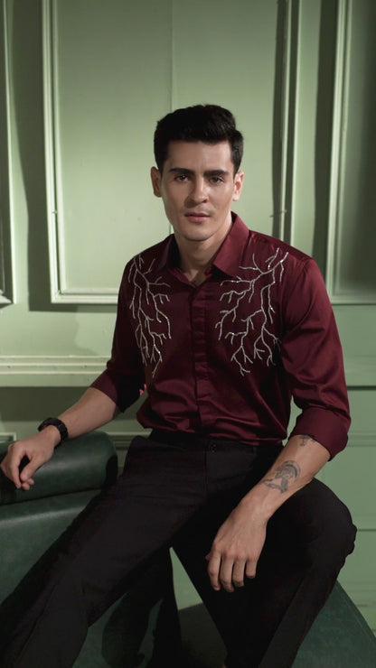 "SILVER LIGHT" EMBROIDERED ON A MAROON SHIRT