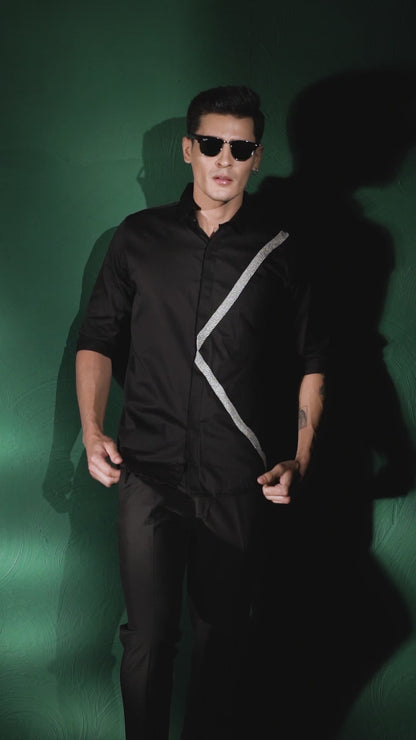 A PAIR OF LINES EMBROIDERED ON A SHIRT